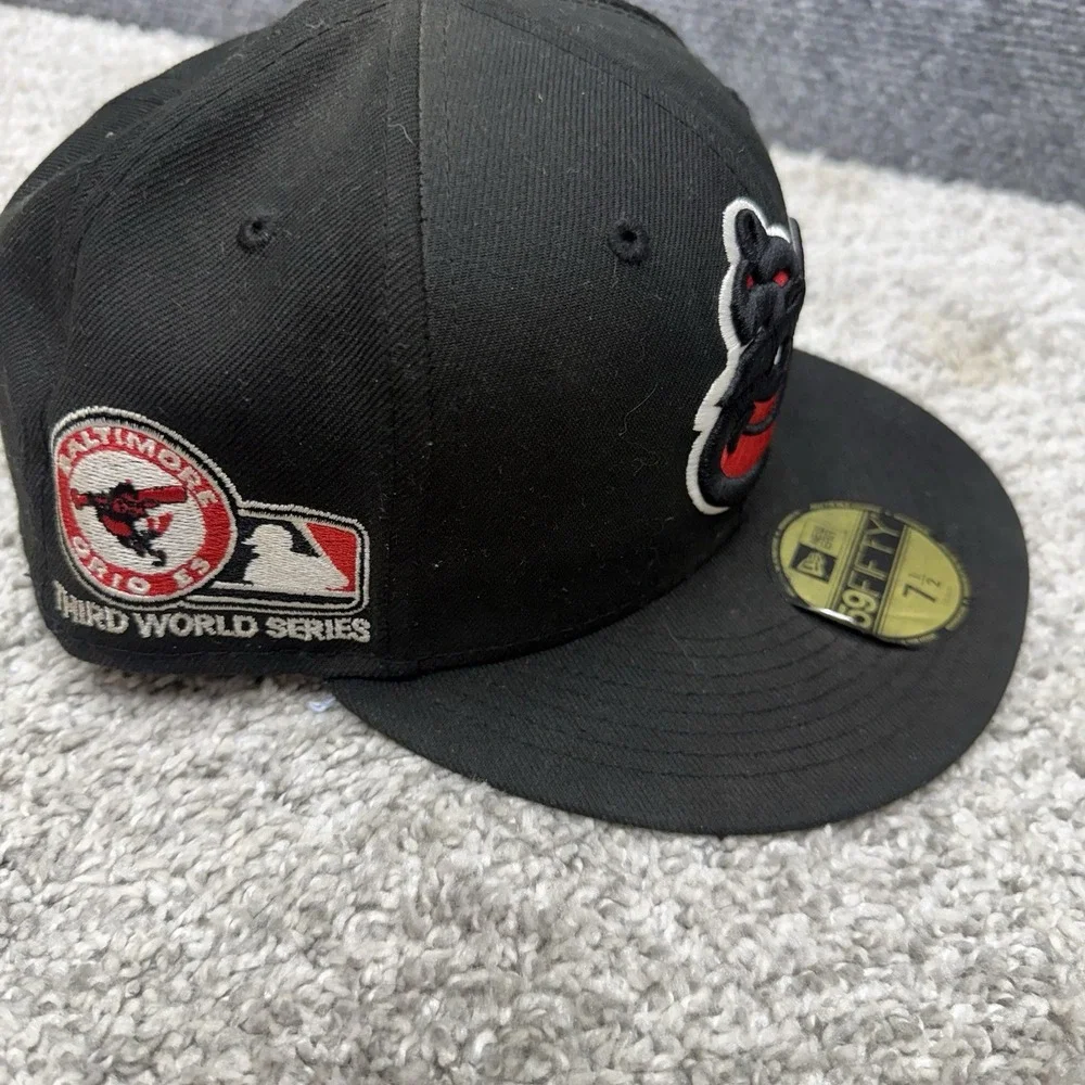 New Era Baltimore Orioles black fitted hat cap men's size 7.5‎ (misprint) DIRTY